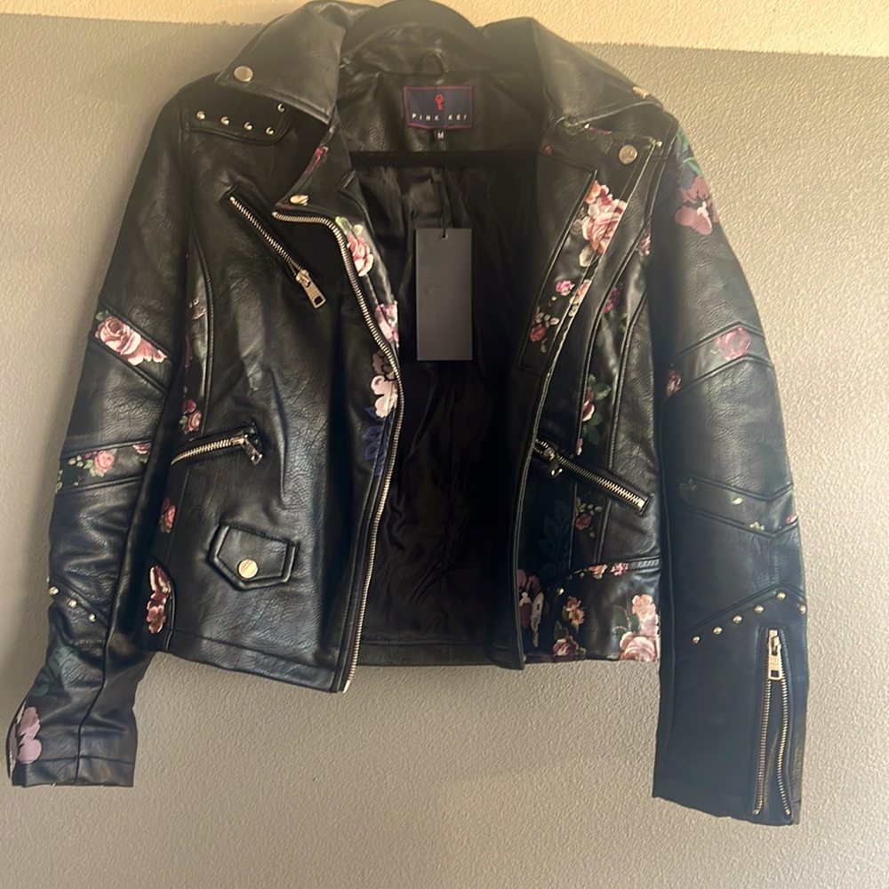 Black leather jacket with flowers
